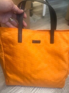 Gucci Orange Embossed GG Tote with Brown Straps bundle with T-shirts
